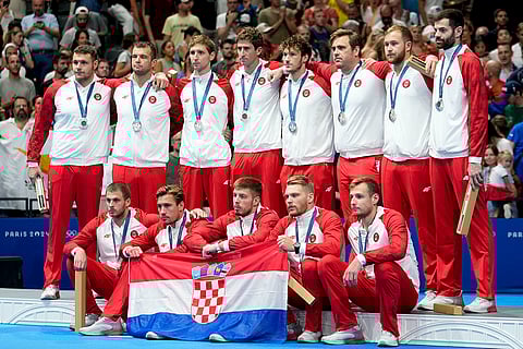 Men's water polo: Croatia's team celebrate after winning silver